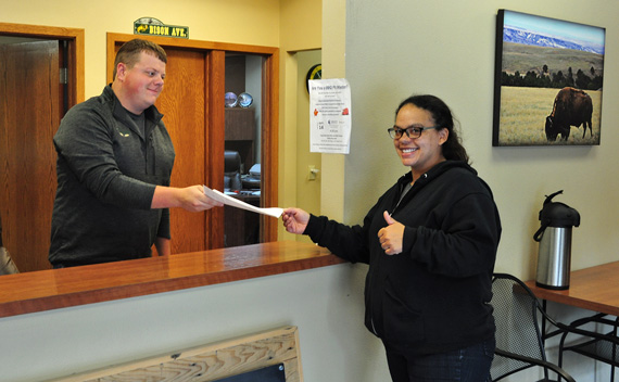 job seeker receiving paperwork